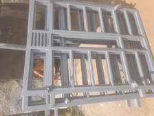 Security window with cross grills