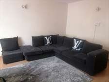 7 seater corner sofa with a matching Pouf.