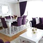 Purple dining chairs/white wooden dining table