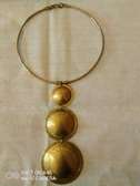 Exotic African-inspired brass necklace