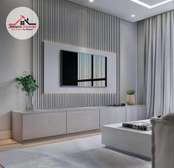 White flutted wall panel wall unit design