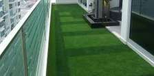 Water resistant grass carpets