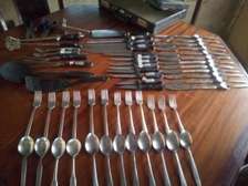 Full set assorted sizes knives spoons  serving spoons