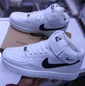 The White and Black nike air force 1 high top sneaker