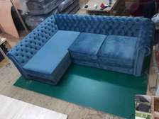 Modern blue four seater L shaped sofa set