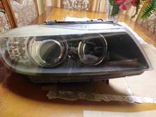Used BMW E90 Right hand front Headlight, year 2009-2012.