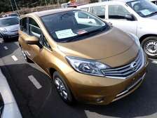GOLD NISSAN NOTE (MKOPO ACCEPTED)
