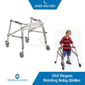 Paediatric walking frame with wheels