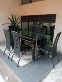 Executive 6 sitter glass dinning table  with leather seat