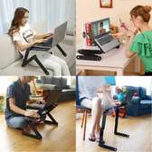 Adjustable laptop stand with mouse pad and fan