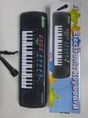 ELECTRONIC KEYBOARD WITH MICROPHONE