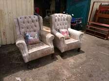 Tufted wingback arm chairs