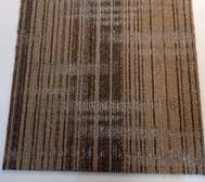 Brown Patterned carpet tile adding warmth to homes/ offices