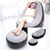 Inflatable seat with ottoman