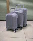 Grey fiber travel suitcases