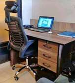 Laptop desk and a headrest chair