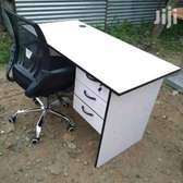 White computer desk with a back curved office chair