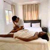 Male therapist offering massage for ladies