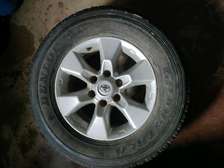 Toyota Silver Rim with Dunlop Grandtrek Tire