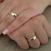 Gold wedding rings.