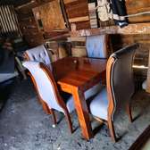 Elegant Wooden Dining Table Set with Upholstered Chairs