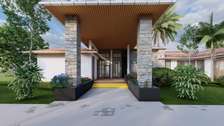 Modern Home with Stone Pillars & Large Windows