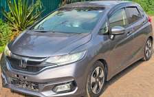 Honda fit non hybrid Silver color fully loaded 1300cc petrol