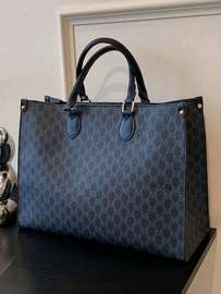 Sleek monogram leather tote bag