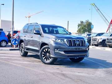 Toyota Prado SUV VX-L Gray Spacious Interior Alloy Wheels