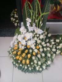 White Rose Funeral Spray arrangement with Baby's Breath