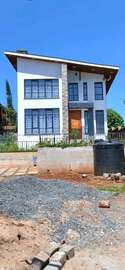 Modern 4-Bedroom Family Home with Large Windows