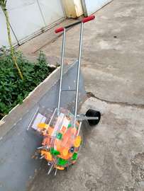 Seed Planter With Fertilizer Dispenser