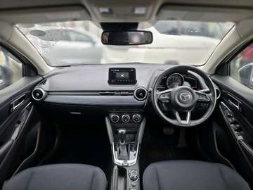 Mazda 2 White color fully loaded 2019 model.