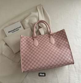 Chic Pink Designer Handbag with Repeating M Pattern
