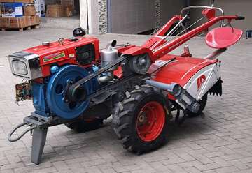 Walking behind tractor