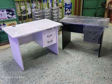 Office desk fitted with three drawers fitted with locks