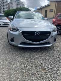 Mazda Demio gray color 2018 model fully loaded silver.