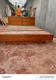 Solid Floating mahogany wooden Bed with natural finish