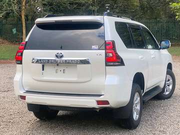 Toyota land cruiser prado white color fully loaded..