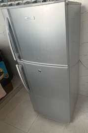 Spacious Silver Refrigerator with Freezer Compartment