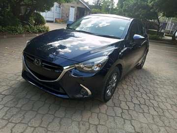 Mazda Demio blue color 2019 model fully loaded.