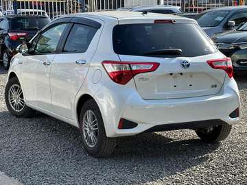 Toyota vitz hybrid white color 2019 model fully loaded