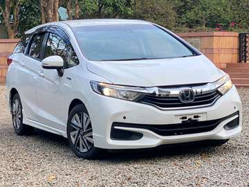 Honda fit shuttle hybrid white color fully loaded 2019 model