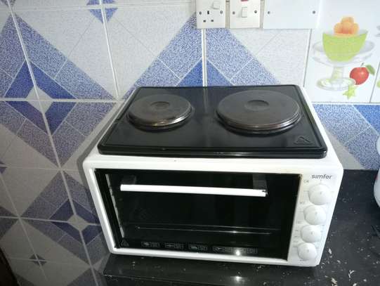 Oven with electric burner image 1