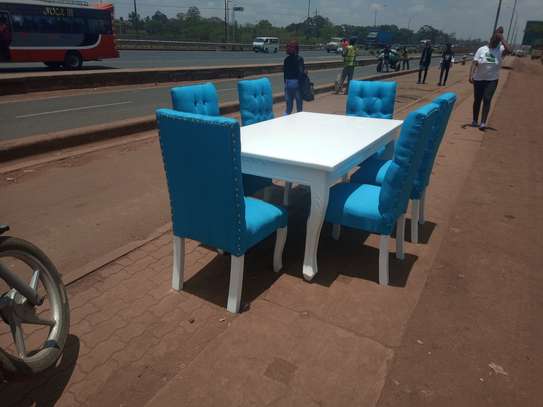 6 seater dining table made by hand wood maonganyi image 5