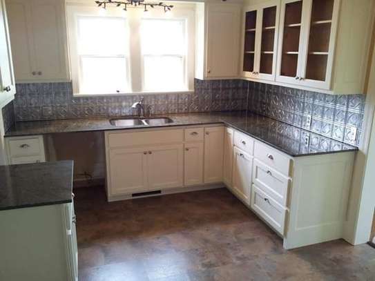 Kitchen Cupboards with Granite Tops & Renovations image 7