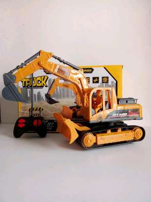 Battery operated excavator
Has music and LED lights image 6