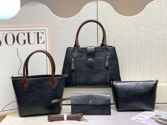 Elegant Grey Faux Leather Handbag with Zipper Pockets image 1