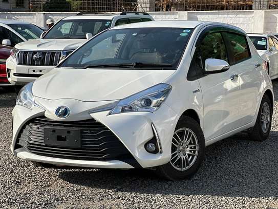 Toyota vitz hybrid white color 2019 model fully loaded image 4