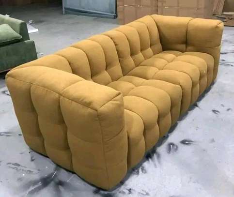 Tufted sofa image 1